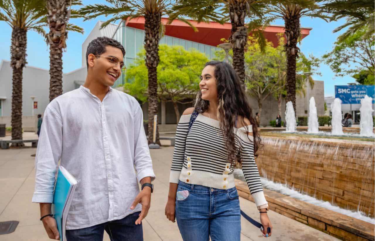 two students walking on campus